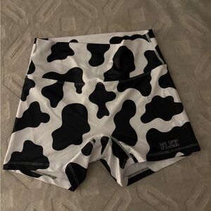 L cow print athletic shorts